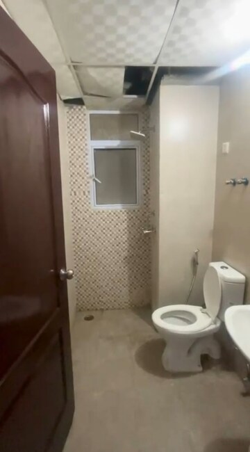 Bathroom in 2 BHK Apartment at Bulland Heights, Sain Vihar – for Rent