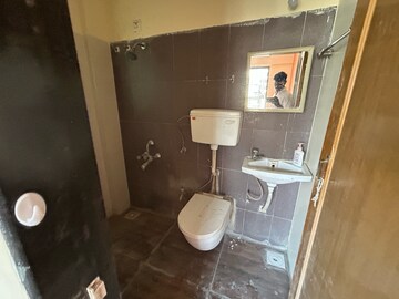 Bathroom in 2 BHK Apartment at Swastik Residency 1, Kavesar – for Rent