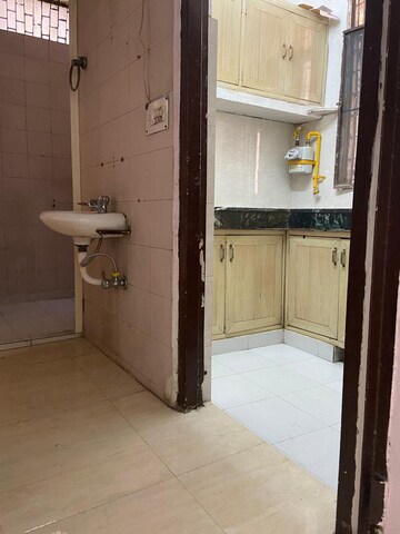 Bathroom in 1.5 BHK Apartment at Uma Cooperative Society, Mayur Vihar 1 – for Rent