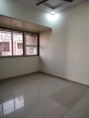 Room in 1 BHK Apartment at Manali Building, Malad West – for Rent