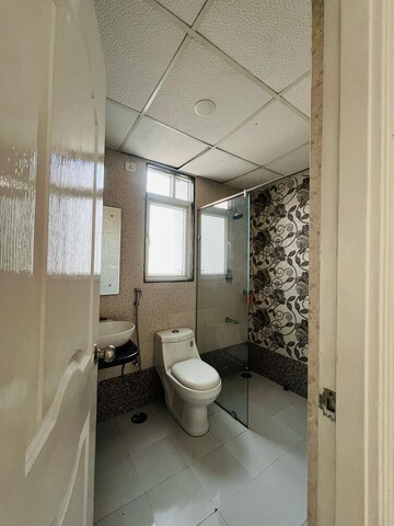 Bathroom in 3 BHK Apartment at Pardos Okas Residency, Sushant Golf City – for Rent