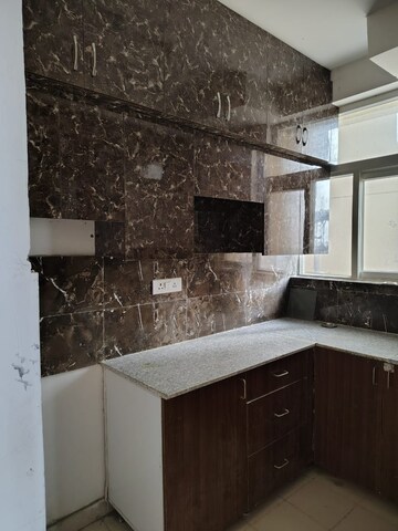 Kitchen in 2 BHK Apartment at Nirala Greenshire, Sector 2 Greater Noida – for Rent