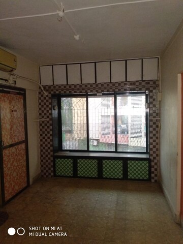 Living Room in 1 BHK Apartment at Amish Park, Mira Road – for Rent