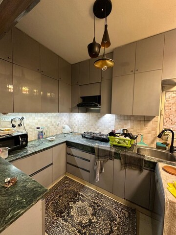 Kitchen in 3 BHK Apartment at ROF Ananda, Sector 95 – for Sale