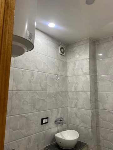 Bathroom in 3 BHK Builder Floor at Rohini Sector 16 – for Sale