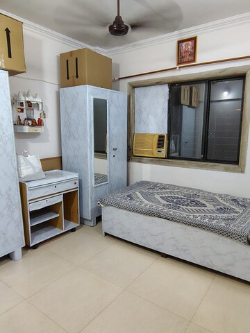 Master Bedroom in 2 BHK Apartment at Swagat CHS Kopar Khairane, Kopar Khairane – for Rent