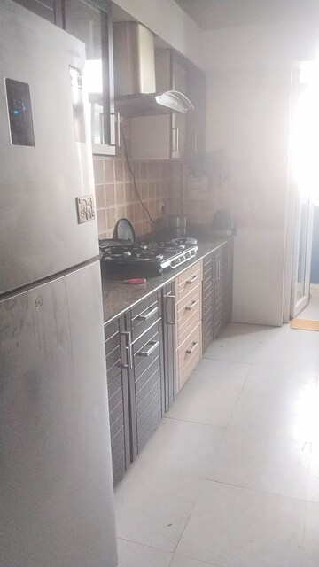 Kitchen in 3.5 BHK Apartment at Amrapali Eden Park, Sector 50 – for Rent