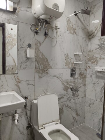 Bathroom in 3 BHK Apartment at Khirki Extension – for Rent