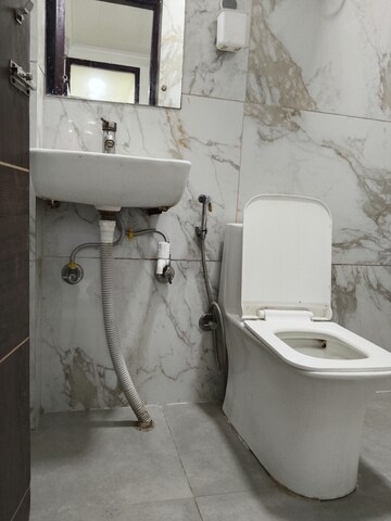 Bathroom in 3 BHK Apartment at Khirki Extension – for Rent