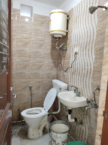 Bathroom in 2 BHK Apartment at Khirki Extension – for Rent