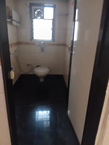 Bathroom in 2 BHK Apartment at Vile Parle East – for Sale
