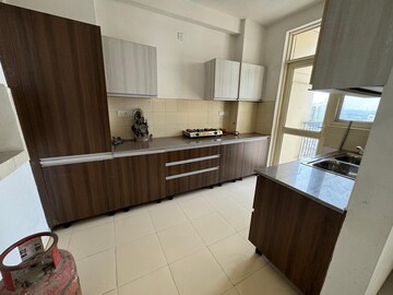 Kitchen in 3 BHK Apartment at Sushma Elite Cross, Dhakoli Village – for Sale