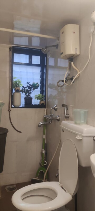Bathroom in 1 BHK Apartment at Nutan Abhishek, Andheri West – for Rent