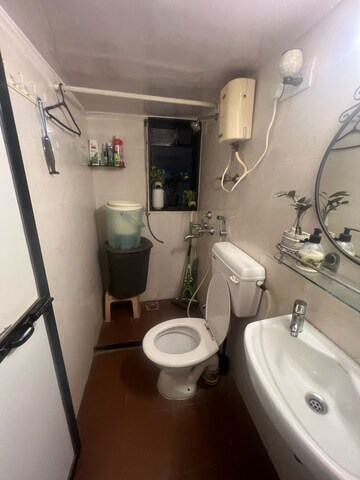 Bathroom in 1 BHK Apartment at Nutan Abhishek, Andheri West – for Rent