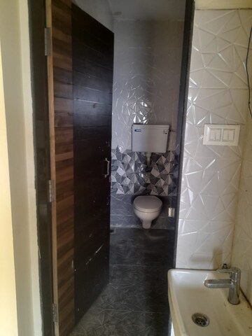 Bathroom in 1.5 BHK Apartment at Royce Paradise, Kalyan West – for Rent