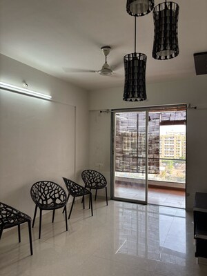 Living Room in 1.5 BHK Apartment at Ravinanda Skylights, Wagholi – for Sale