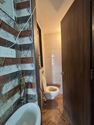 Bathroom in 1.5 BHK Apartment at Ravinanda Skylights, Wagholi – for Sale