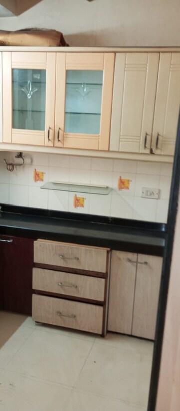 Kitchen in 2 BHK Apartment at Sai Baba Enclave, Goregaon West – for Rent