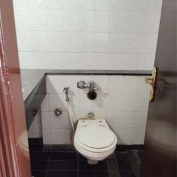 Bathroom in 2 BHK Apartment at Satellite Garden, Umershetpada – for Rent