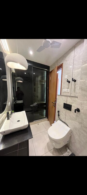 Bathroom in 4 BHK Builder Floor at Paras Trinity, Sector 63 – for Sale