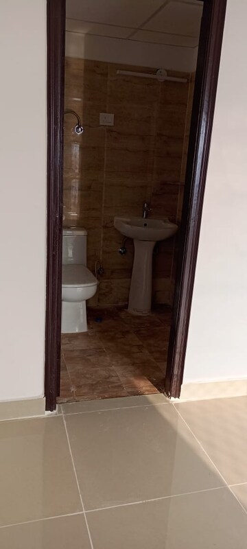 Bathroom in 3 BHK Apartment at Ajnara Le Garden, Sector 16b Greater Noida – for Rent
