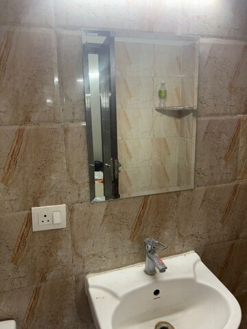 Bathroom in 3 BHK Apartment at Ajnara Le Garden, Sector 16b Greater Noida – for Rent