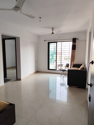 Living Room in 2 BHK Apartment at Damji Mahavir Exotica, Ghodbunder Road – for Sale