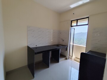 Master Bedroom in 2 BHK Apartment at Ram Pushpanjali Residency, Owale – for Rent