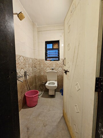 Master Bedroom in 1 RK Apartment at Raut Baug Housing Complex, Dhankawadi – for Rent