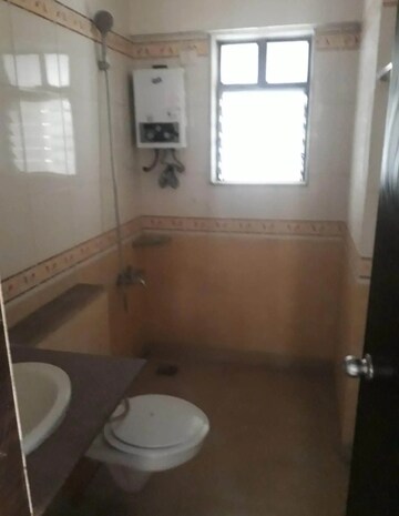 Bathroom in 2 BHK Apartment at Jasmine Tower, Vasant Vihar – for Rent