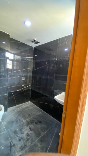 Bathroom in 4 BHK Builder Floor at Mahavir Enclave – for Sale