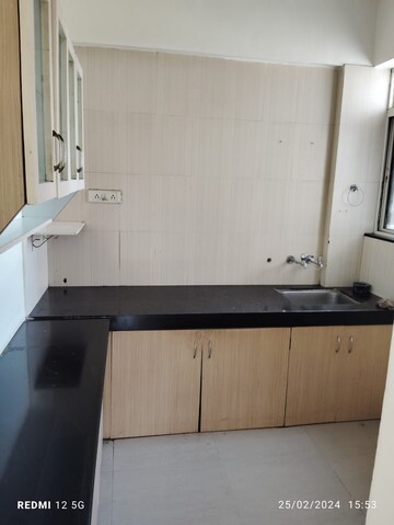 Kitchen in 2 BHK Apartment at Gulmohar Helios, Kharadi – for Rent