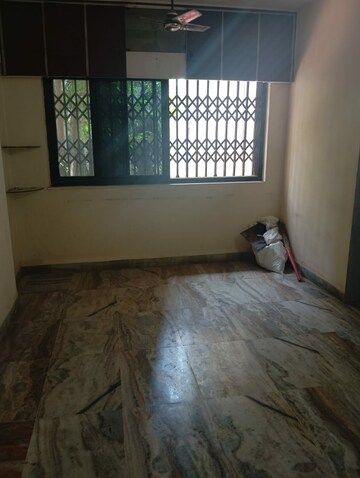 Room in 1 BHK Apartment at Om Kalyani CHS, Dahisar West – for Rent