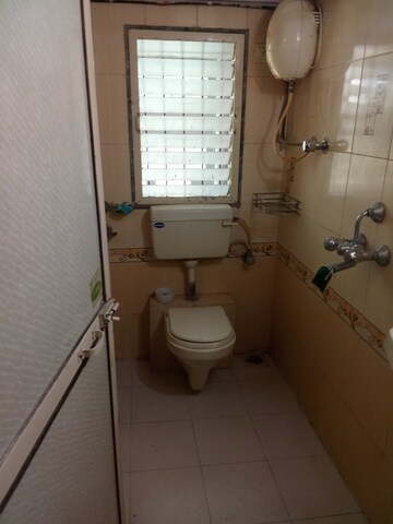 Bathroom in 2 BHK Apartment at Mathura Vihar CHS, Borivali West – for Rent