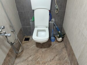 Bathroom in 1 BHK Apartment at Shubharambh Complex, Manpada – for Sale