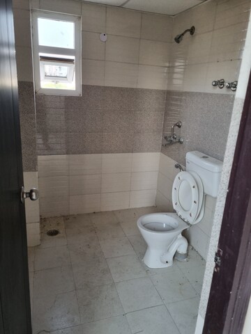 Bathroom in 3 BHK Apartment at Emaar Gurgaon Greens, Sector 102 – for Sale