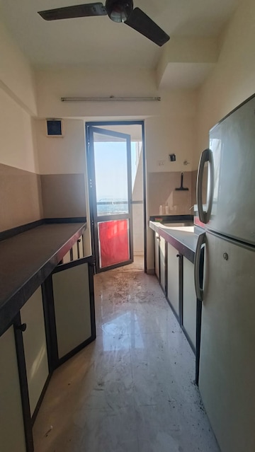 Kitchen in 1 BHK Apartment at Lodha Palava City Lakeshore Greens, Dombivli East – for Rent