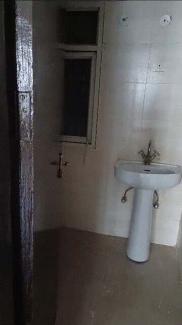 Bathroom in 3 BHK Apartment at GH-7 Crossings Republik, Vijay Nagar – for Rent