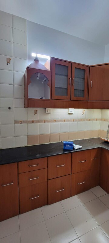 Kitchen in 3 BHK Apartment at Swojas Sarthak, Law College Road – for Rent