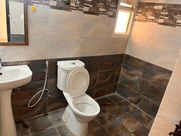 Bathroom in 3 BHK Apartment at JKG Palm Court, Sector 16c Greater Noida – for Rent