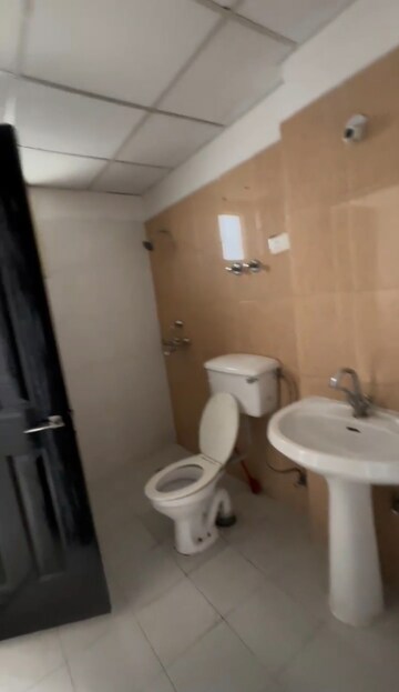Bathroom in 2 BHK Apartment at Bulland Heights, Sain Vihar – for Sale