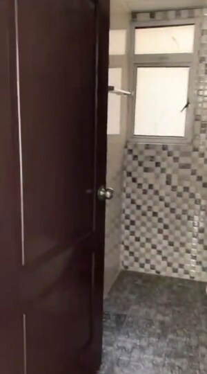 Bathroom in 2 BHK Apartment at Bulland Heights, Sain Vihar – for Sale