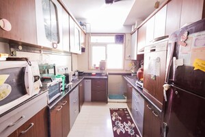 Kitchen in 2.5 BHK Apartment at Pride Presidency Luxuria, Ghodbunder Road – for Sale