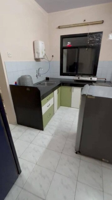 Kitchen in 2 BHK Apartment at Eden Garden CHS, Viman Nagar – for Rent