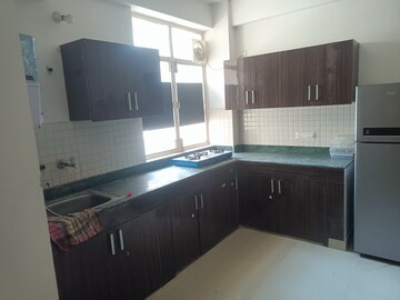 Kitchen in 2 BHK Apartment at Breez Global Heights, Sohna Sector 33 – for Rent