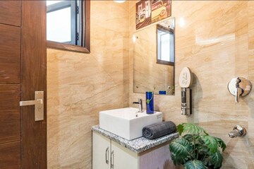 Bathroom in 3 BHK Builder Floor at Freedom Fighters Enclave – for Rent