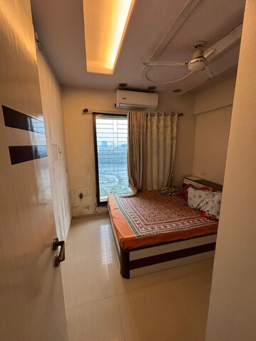 Living Room in 2.5 BHK Apartment at Breeze Park, Kopar Khairane – for Sale