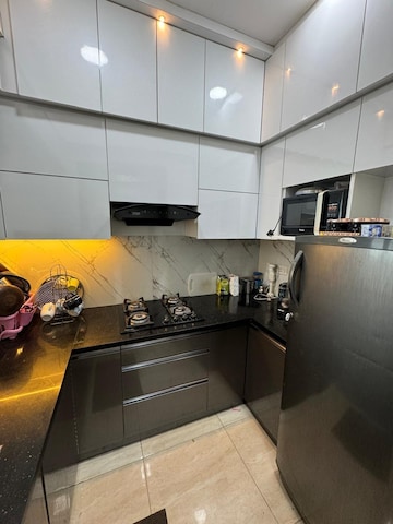 Kitchen in 2 BHK Apartment at Gaur City 7th Avenue, Sector 4, Greater Noida – for Rent