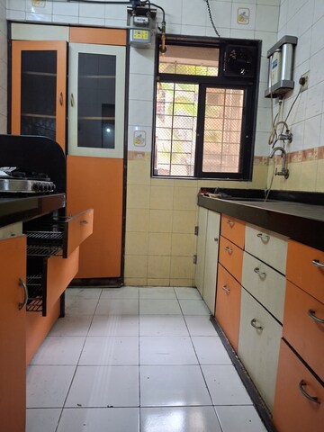 Kitchen in 2.5 BHK Apartment at Mudit Garden, Kopar Khairane – for Rent
