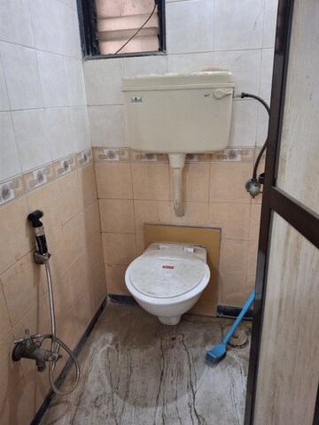 Bathroom in 2.5 BHK Apartment at Mudit Garden, Kopar Khairane – for Rent